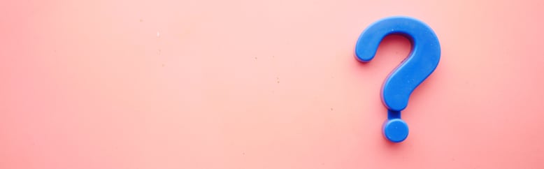 Blue question mark on pink background