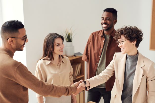 Two people shaking hands.