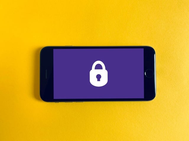 iPhone with an image of a lock displayed on it