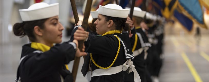 Two female soldiers holding flags-1